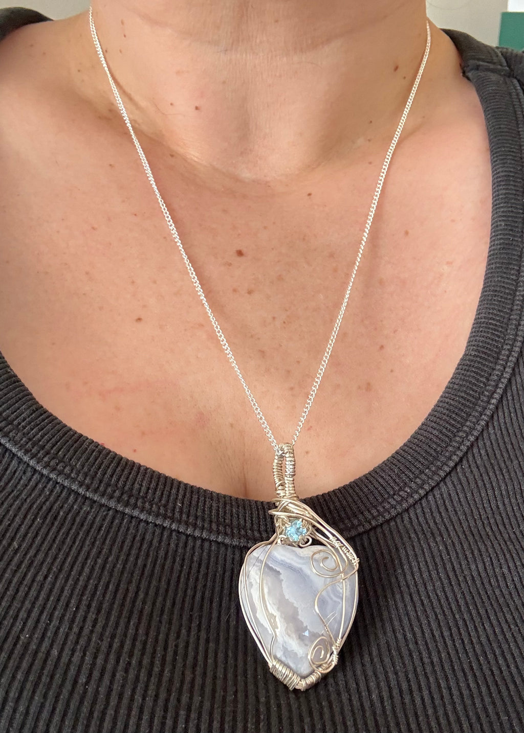 Blue lace agate heart pendant with sky blue topaz accent stone