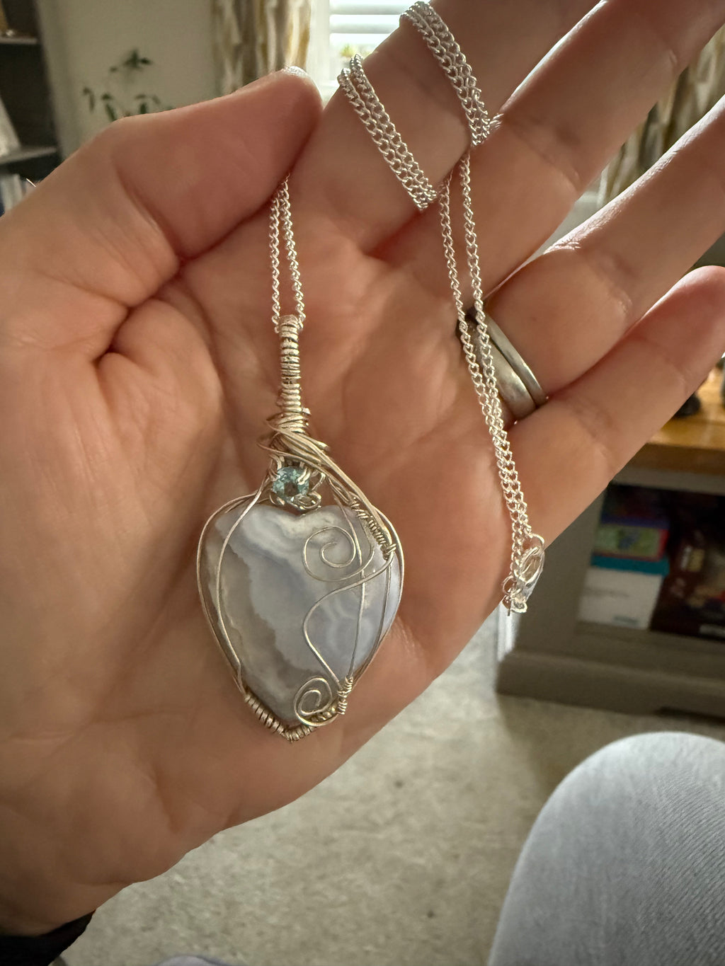 Blue lace agate heart pendant with sky blue topaz accent stone