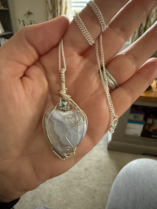 Blue lace agate heart pendant with sky blue topaz accent stone